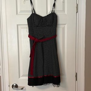 Dress with ruffle underneath